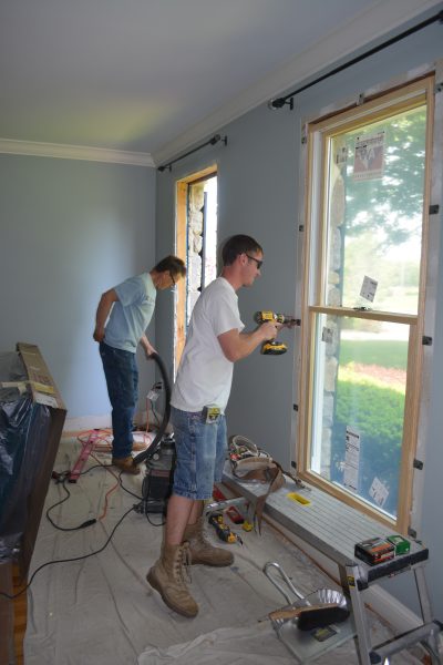 Gary & Jeremy installing window